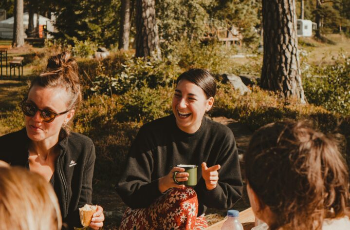 Group of people gathered enjoying nature